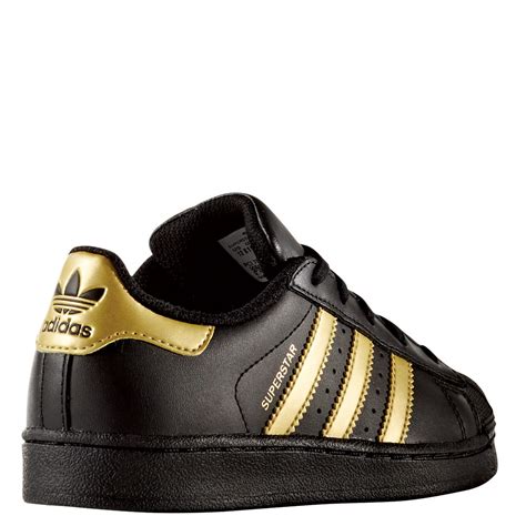 adidas schuhe kinder schwarz gold|Gold .